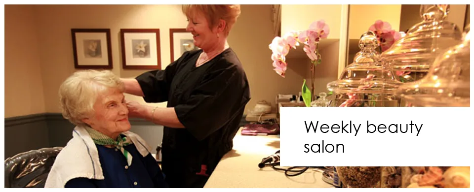 Weekly beauty salon — a resident having her hair styled